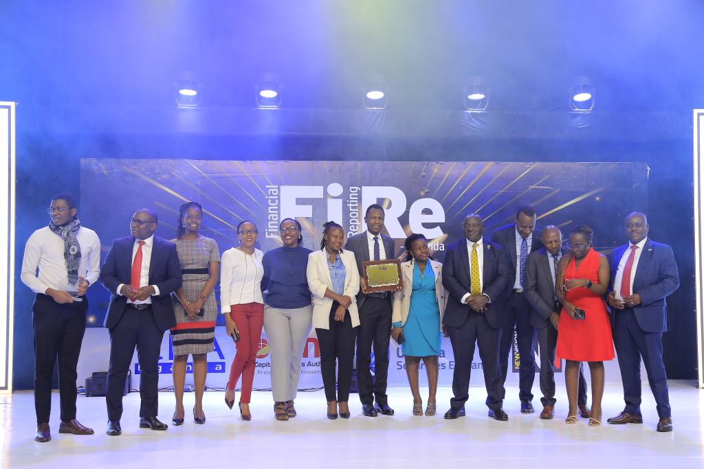 National Social Security Fund representatives posing for a photograph with their gold award in financial reporting under the Integrated Report of the Year award category at the 2024 Financial Reporting (FiRe) awards.