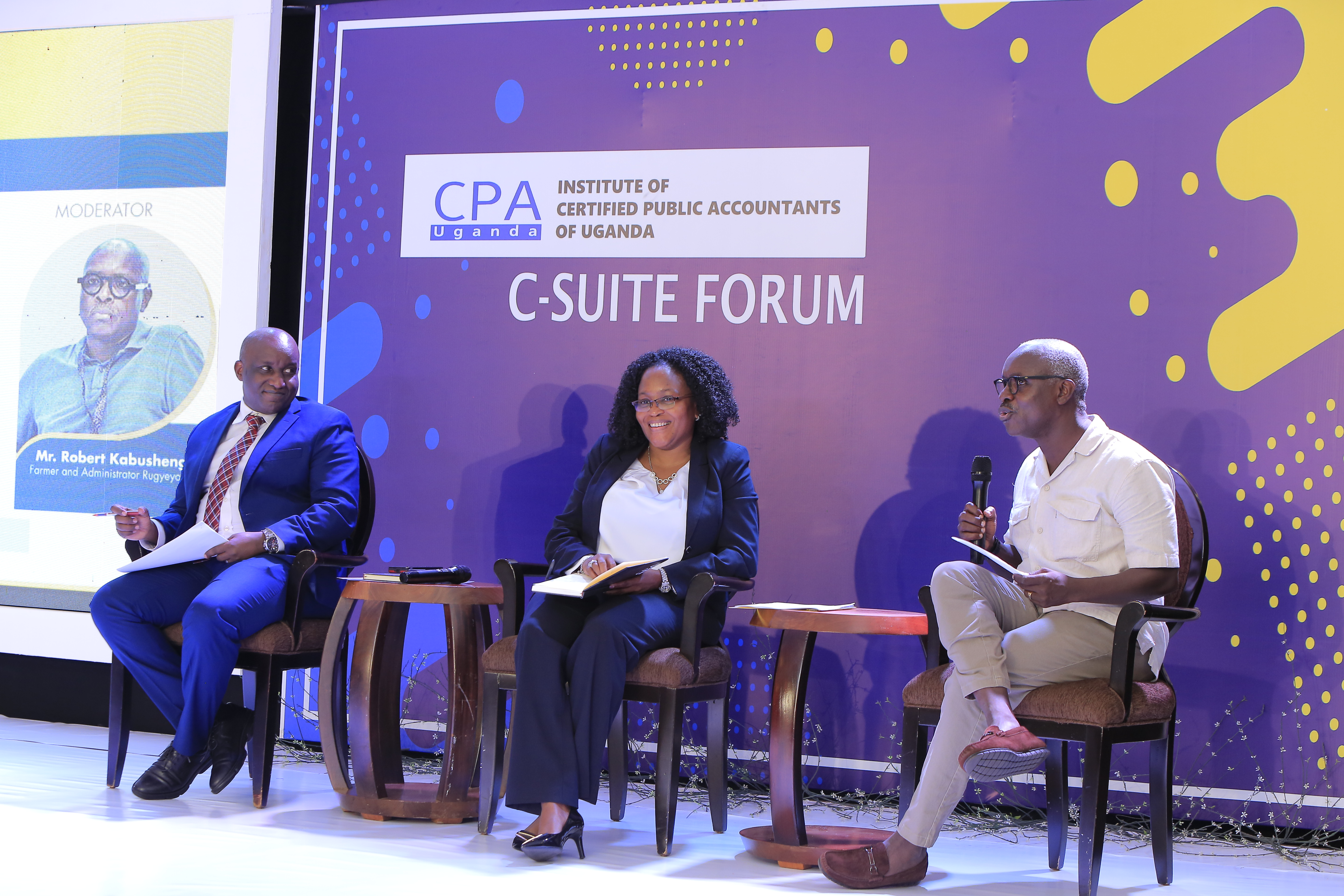 C-suite Panel: Robert Kabushenga, Farmer & Administrator Rugyeyo Farm – C-Suite Moderator (right), Ms Proscovia Nabbanja, CEO UNOC (middle) and CPA Joshua Karamagi, Managing Director UETCL (left).