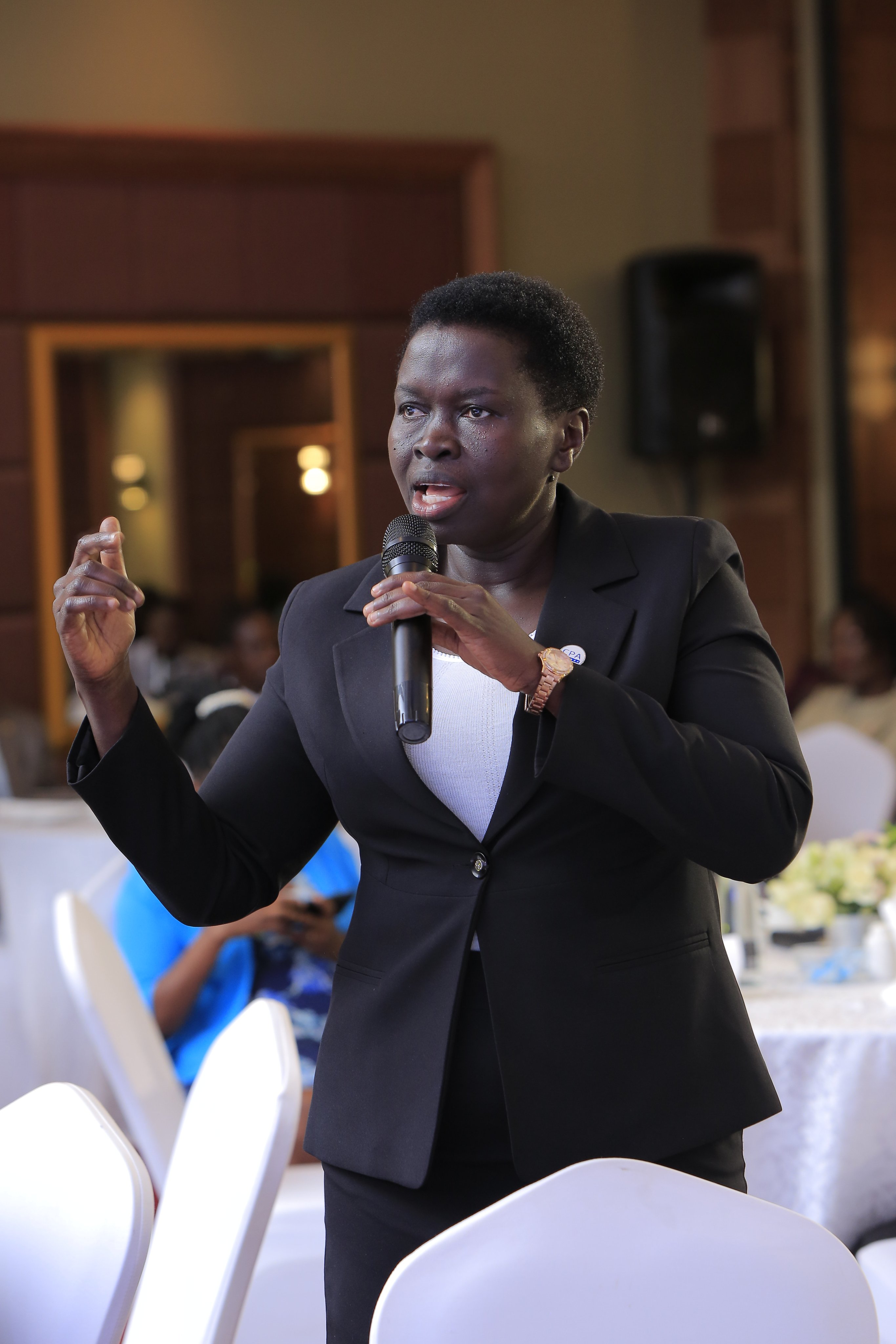 CPA Sarah Chelangat, Commissioner Domestic Tax, URA giving her remarks during the Q&A session at the 2nd C-Suite Forum at the Kampala Sheraton Hotel.