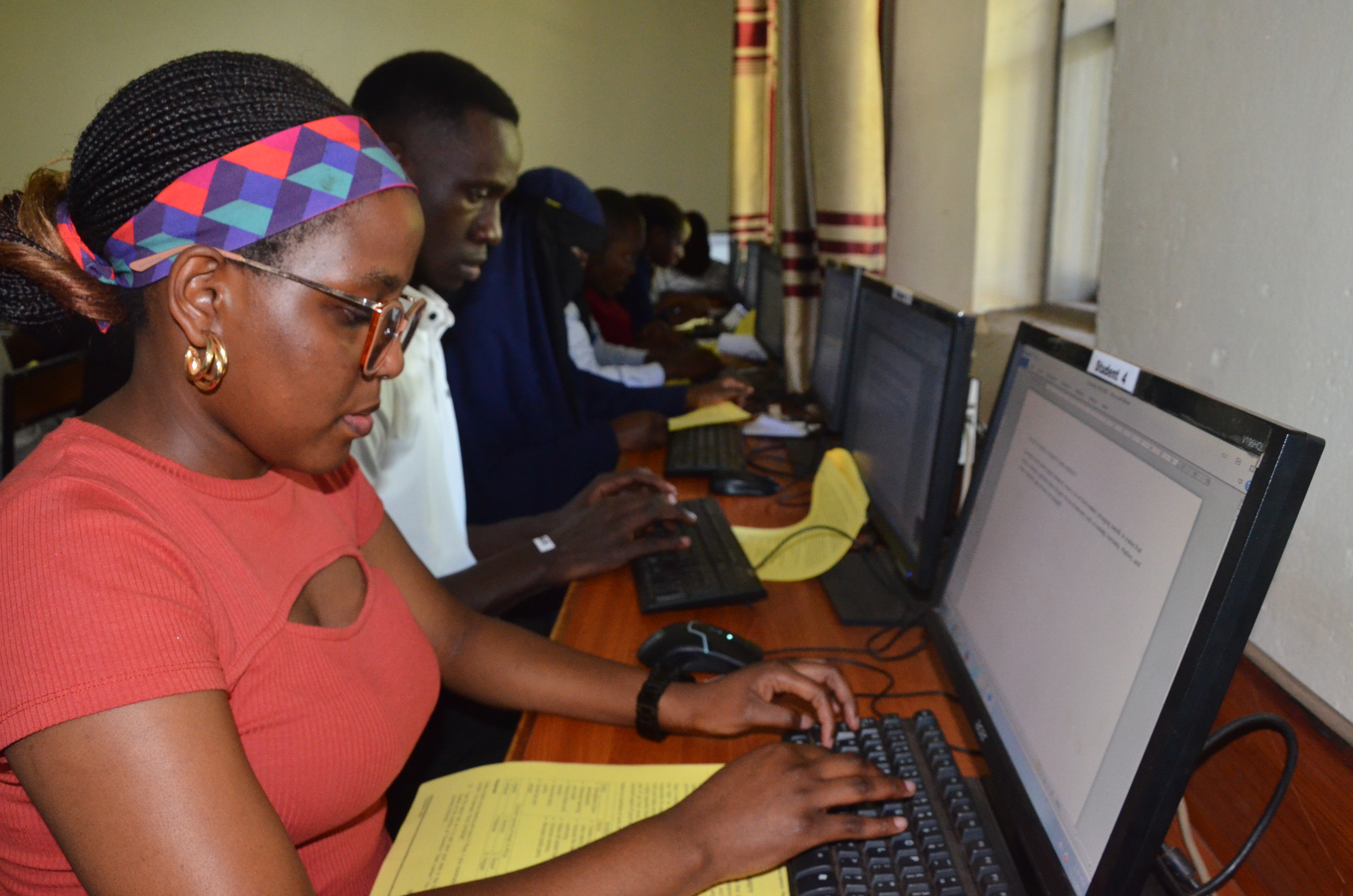 A CPA Candidate sitting for CPA Paper 4 Management & Information Systems examination at the Kampala centre at Mengo SS