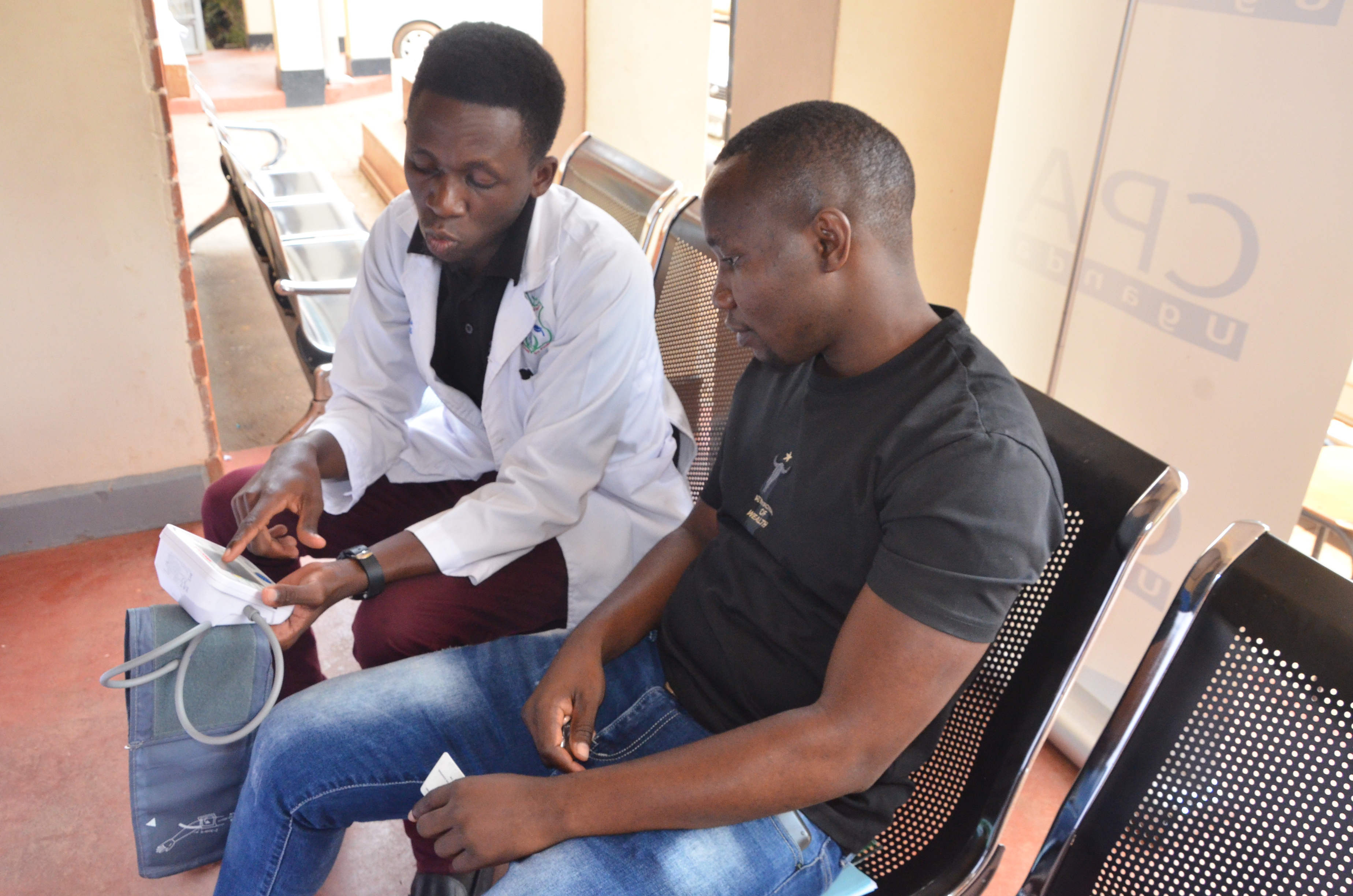 A nurse from St John Ambulance attending to a student at the Kampala examinations centre.