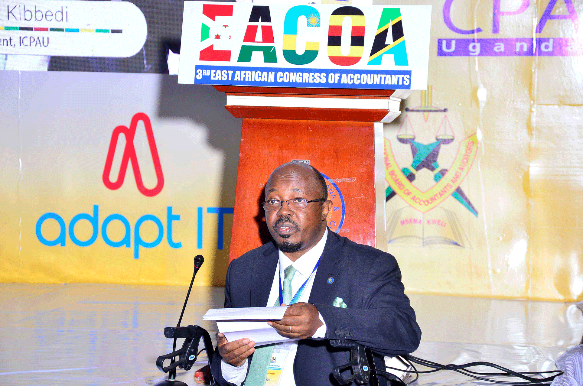 CPA Frederick Kibbedi the President of ICPAU delivering his message