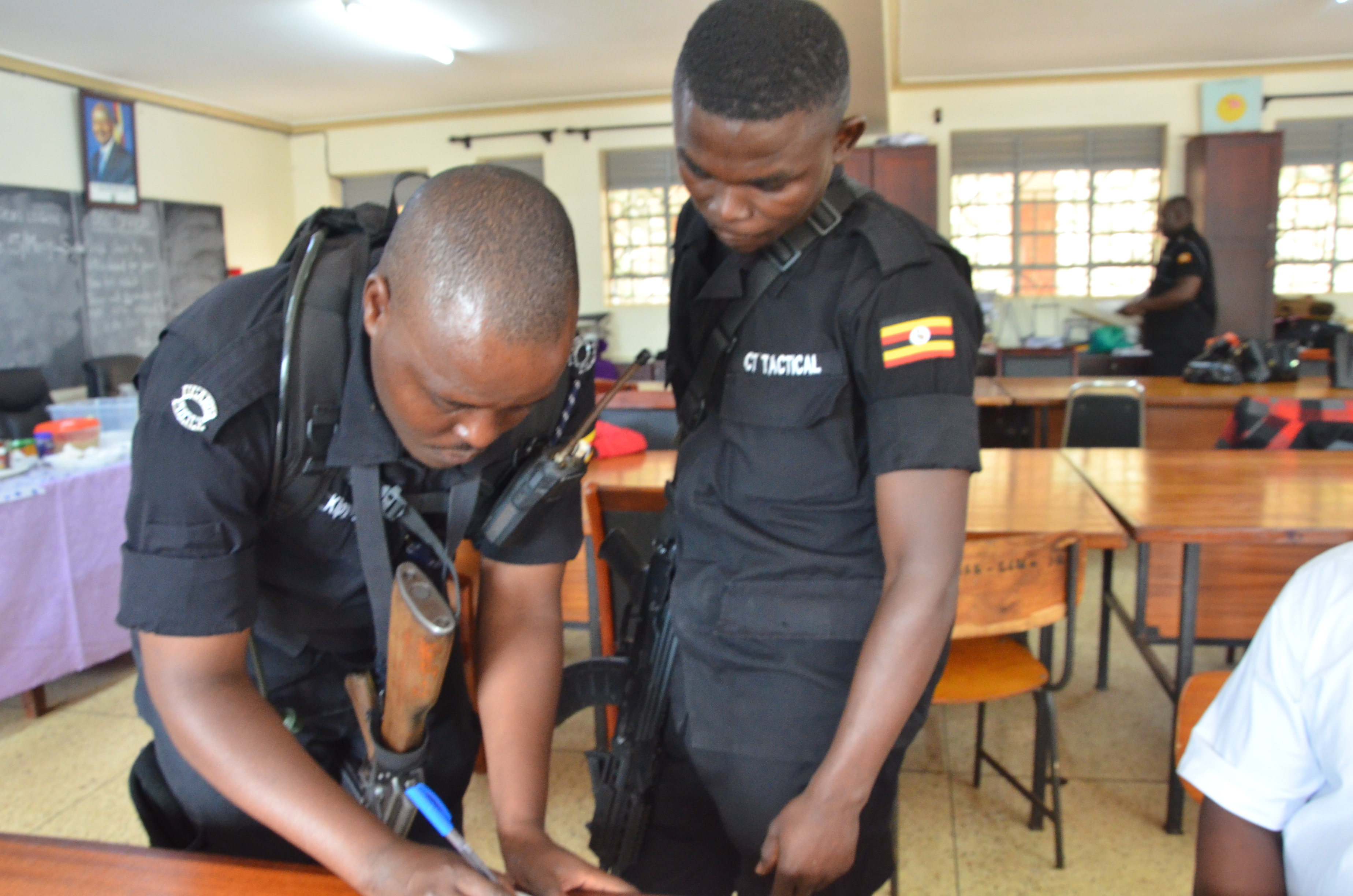 Some of the police operatives manning the December 2024 Kampala examinations centre at Mengo SS.