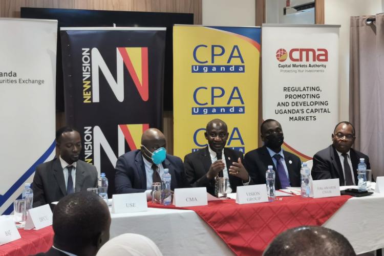 L-R: Mr Andrew Mwima - Trading and Research Manager at USE, Mr Ssembuya Dickson - Director of Research and Market Development at CMA, CPA Gervase Ndyanabo -Deputy Managing Director of Vision Group, CPA Stephen Ineget - Chairman of the Financial Reporting Awards Committee and Mr John Ntangaare, Director – Education at ICPAU